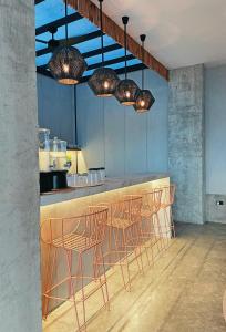 Area lounge atau bar di Eolia Sustainable Design Hotel