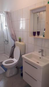 Ένα μπάνιο στο LEVANDA +30 φωτογραφίες
