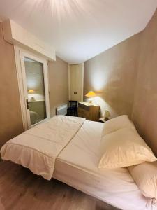 Posteľ alebo postele v izbe v ubytovaní Appartement 2 pièces à Cabourg