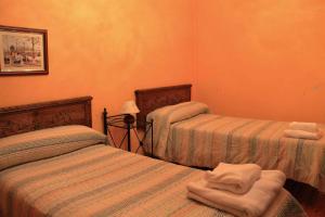 A bed or beds in a room at La Fábrica de Cabornera Casa aislada con jardín