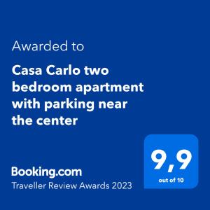 Un certificat, premiu, logo sau alt document afișat la Casa Carlo apartment with parking near the center
