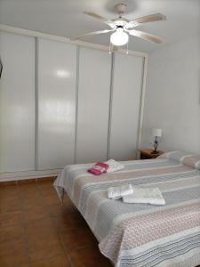 A bed or beds in a room at Alcaraván 32 Még 27 kép