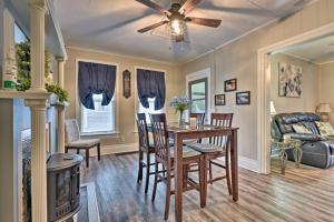 a dining room with a table and chairs at Niagara Falls Townhome Near Wineries! in Niagara Falls