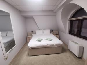 Letto o letti in una camera di City SMART