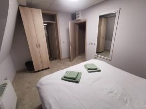Letto o letti in una camera di City SMART