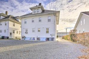 a house under construction on a street at Allenhurst Abode with Porch and Central Location! 