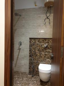 Koupelna v ubytování Hotel Rama residency