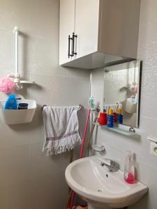 a bathroom with a sink and a mirror at Doğa ile baş başa kalabileceğiniz, sakin kırevi in Rize