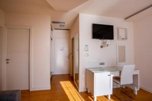 TV a/nebo společenská místnost v ubytování Hotel Pleter