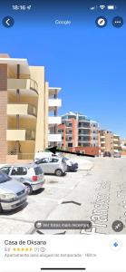 a picture of a parking lot with cars parked at Casa de Oksana in Lagos