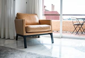 Posedenie v ubytovaní Tropical Palmy 3 bedroom Townhouse in Nueva Andalucia close to Puerto Banus