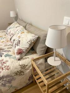 Krevet ili kreveti u jedinici u okviru objekta Appartamento con terrazza e parcheggio privato