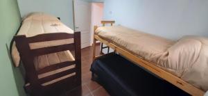 Postel nebo postele na pokoji v ubytování Cabañas WerMa