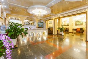 a large room filled with lots of furniture at Grand Hotel Uyut in Krasnodar