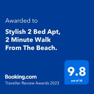 Un certificat, premiu, logo sau alt document afișat la Stylish 2 Bed Apt, 2 Minute Walk From The Beach.