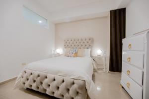 Postel nebo postele na pokoji v ubytování Luxury Condo Perfect for Families & Groups
