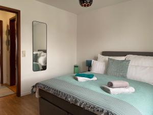 Llit o llits en una habitació de Modernes Apartment I Parkplatz I Netflix I Zentrum