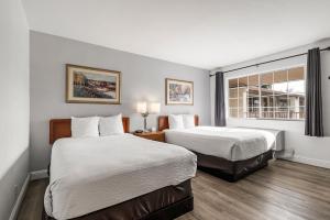 Postel nebo postele na pokoji v ubytování Heritage Inn Express Chico + 79 fotografií