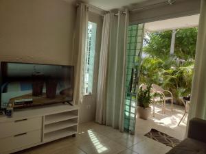 TV a/nebo společenská místnost v ubytování Triplex Beach Selma