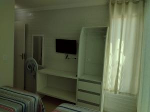 TV a/nebo společenská místnost v ubytování Triplex Beach Selma