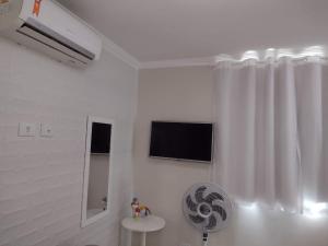 TV a/nebo společenská místnost v ubytování Triplex Beach Selma