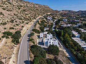 an aerial view of a village with a road at Matala Prime Villas in Matala