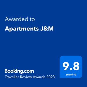 a blue screen with the text awarded to applicants jrm at Apartments J&M in Ohrid