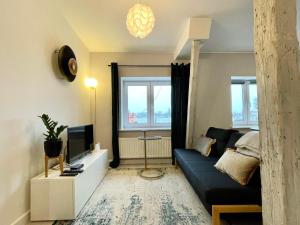 Posteľ alebo postele v izbe v ubytovaní Apartament Helena
