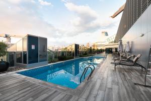 Πισίνα στο ή κοντά στο SIMPLY COMFORT in J ONE Tower