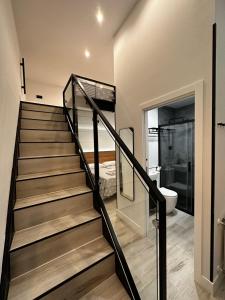 a staircase in a house with a bathroom at CC Atocha Apartments in Madrid