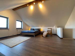 En eller flere senge i et værelse på Ferienhaus Marie