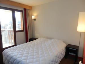 เตียงในห้องที่ Appartement Avoriaz, 3 pièces, 7 personnes - FR-1-634-10