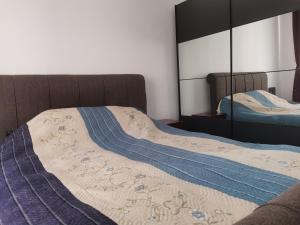 מיטה או מיטות בחדר ב-Casa Potcoava