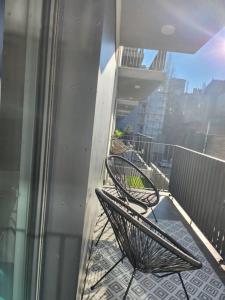 A balcony or terrace at Alice Central Apartment