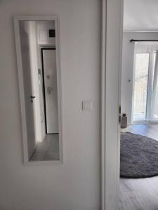 A bed or beds in a room at Alice Central Apartment