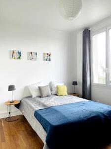 Posteľ alebo postele v izbe v ubytovaní Maison avec vue mer à Port Manec'h, GR 34 à pied