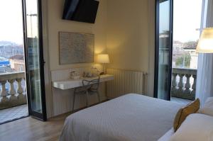 Postel nebo postele na pokoji v ubytování Hotel La Nuova Rotaia
