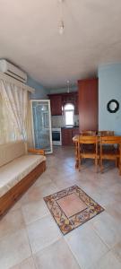 Kuchyň nebo kuchyňský kout v ubytování Villa Mitselo Apartments