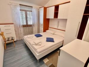 Postel nebo postele na pokoji v ubytování Apartman Gaga