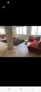a living room with a couch and a table at Downtown SLC Apt w/amenities in Salt Lake City