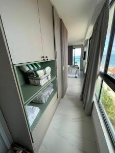 Gambar di galeri bagi Flat à Beira Mar Com Varanda e Piscinas Naturais 308 di Ipojuca