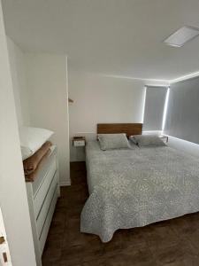 En eller flere senge i et værelse på Azules 2721