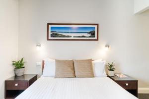 Huskisson Hotel客房内的一张或多张床位