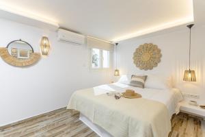 Postel nebo postele na pokoji v ubytování Naxian Nest 2BR Apart Near Beach - Semi Basement