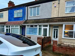 a white car parked in front of a house at Bramhall House - Great for Contractors or Family Holidays in Cleethorpes