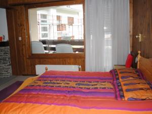 Ένα ή περισσότερα κρεβάτια σε δωμάτιο στο Residence Alexia