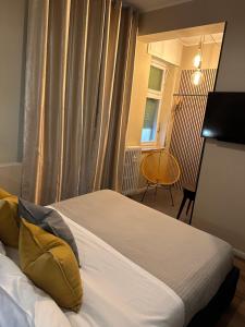Postel nebo postele na pokoji v ubytování Rigoletto Rental Rooms