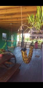 Uma varanda ou terraço em Morada Sol e Lua Container Guarda do Embaú com Ar condicionado