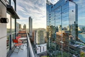 a balcony with a view of a city at Downtown Properties in Vancouver