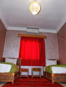 Postel nebo postele na pokoji v ubytování Appartement Afgo Ouarzazate